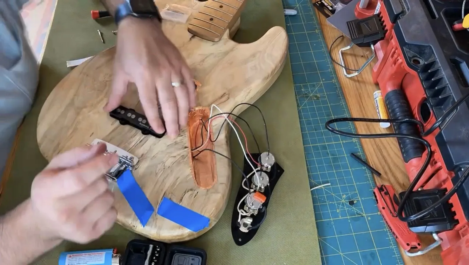Wiring pickups and electronics into a guitar body