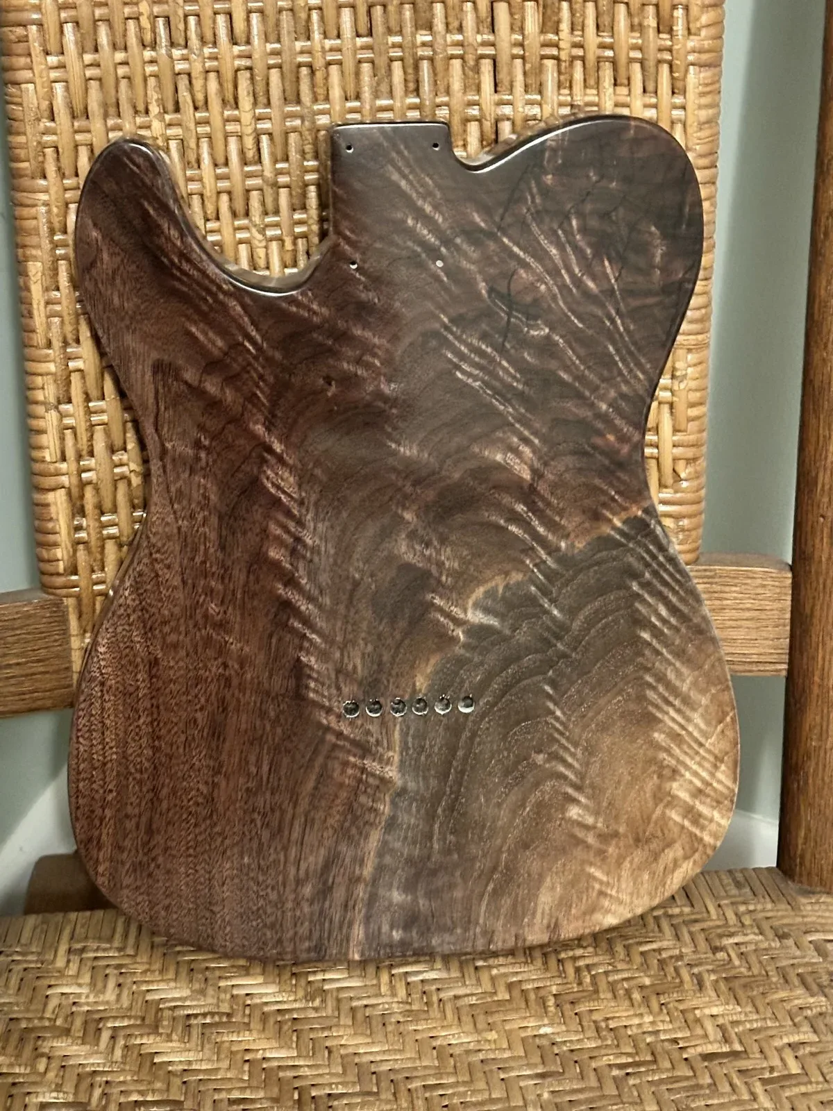 Back of a stained walnut guitar body