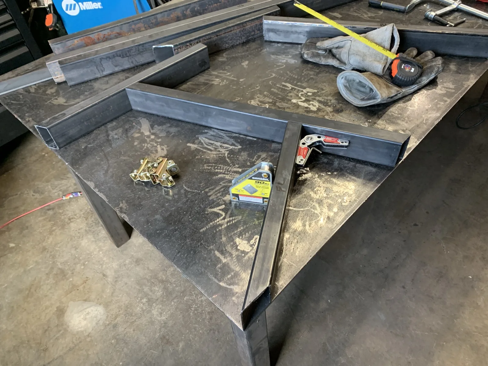 Welded steel triangular table base corner
