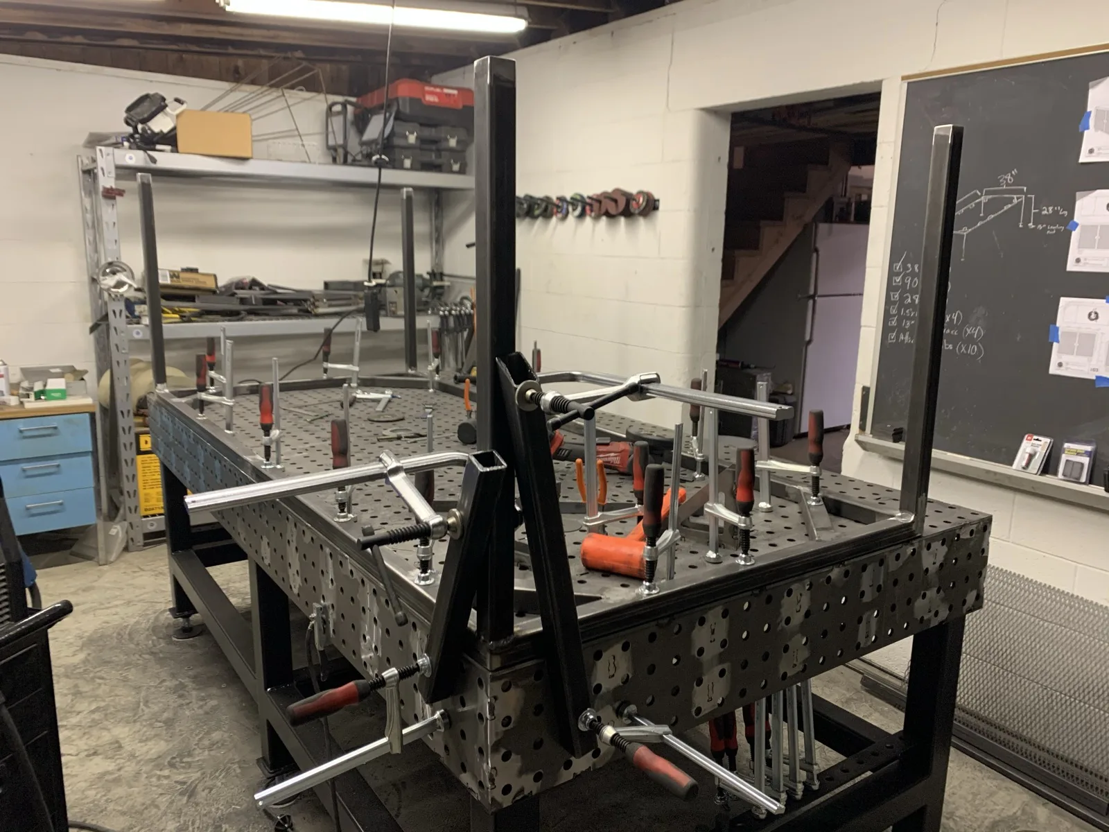 Welding table with a large vise clamp fixture