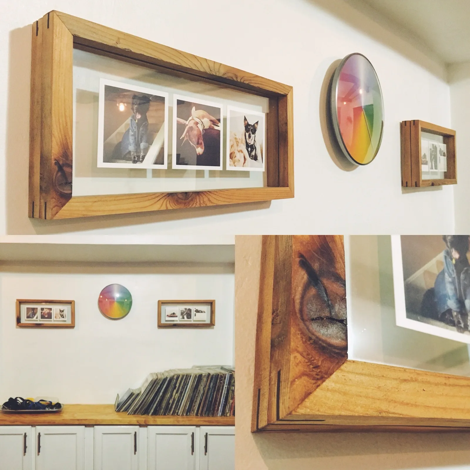 Wall-mounted wooden shadow box frames with photos and a color wheel